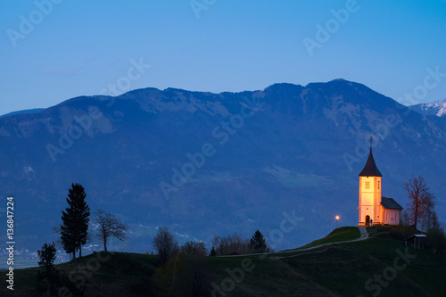 Church on the hill at sunset at Jamnik