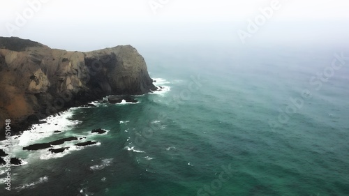 Cliffs At Ocean On Foggy Day