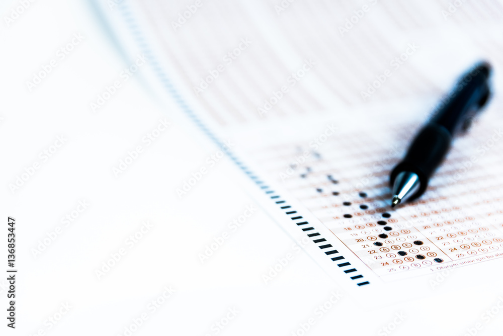pencil and test paper on isolated white background pencil and test paper on isolated white background