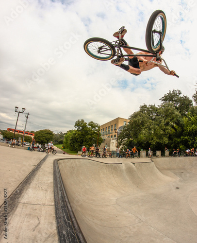 Man performing stunt on bike at skate park, Austin, Texas, United States of America 