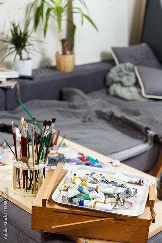 Art studio with brushes ,paints