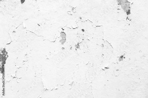 Weathered and peeled off light gray concrete wall in black&white.