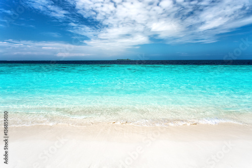 Soft wave at tropical sand beach island, Maldives © Ivan Kurmyshov