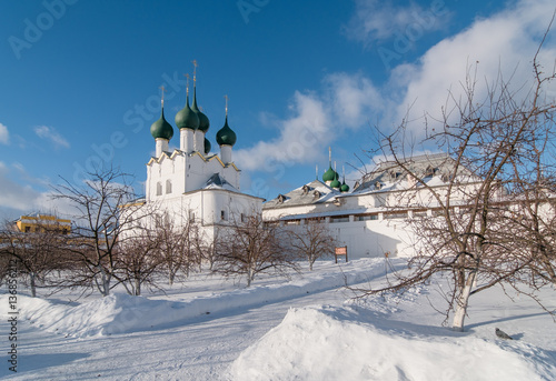 Rostov Kremlin in winter day. Church of St. Gregory the Theologian and the House - view from the garden of the Metropolitan
