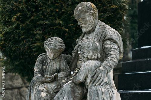 Monument with doctor and children