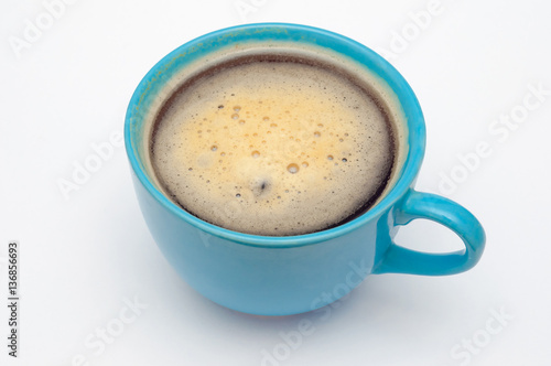 Blue cup of coffee. Espresso isolated on white.
