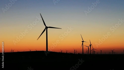 wind turbine on the autumnal sunset steppe in Xilingol, China.