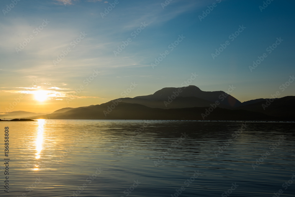 Sunrise over lake in Scotland