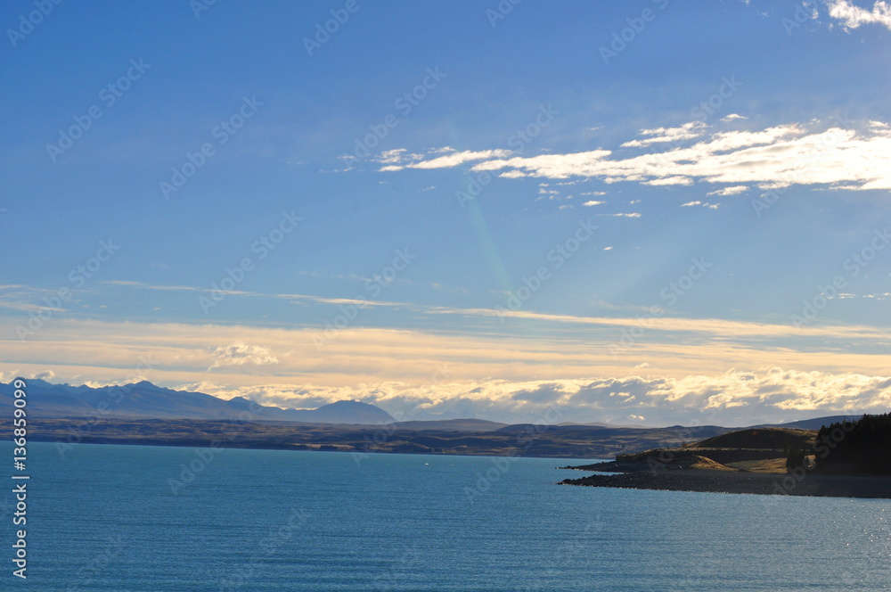 Mount Cook viewpoint with the lake Pukaki and road leading to mount cook village