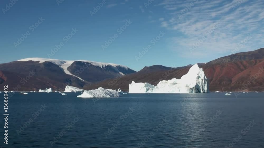 Bow of Icebreaker Ship breaks the ice. Top view. Ice floats and and icebergs on the ocean surface in the Antarctic. Amazing beautiful views of Nature and landscape of snow, ice and white of Antarctic. Bow of Icebreaker Ship breaks the ice. Top view. Ice floats and and icebergs on the ocean surface in the Antarctic. Amazing beautiful views of Nature and landscape of snow, ice and white of Antarctic.
