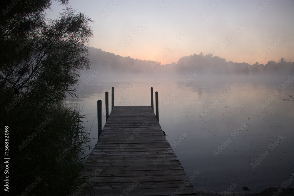 Morning fog over a lake