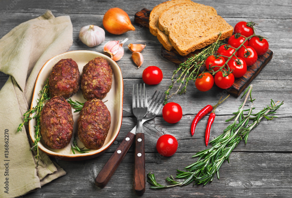 © fserega - Meat cutlets on ceramic dish