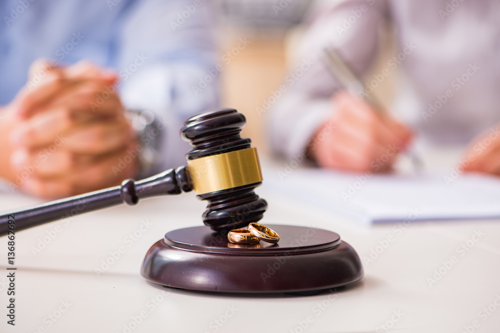 Judge gavel deciding on marriage divorce Judge gavel deciding on marriage divorce