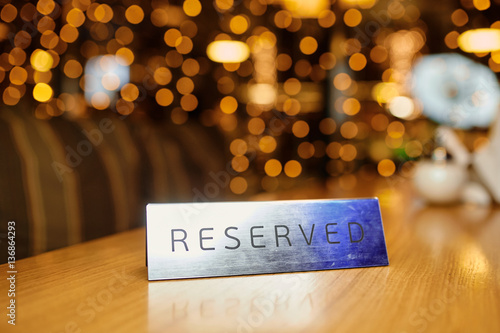 Reserved plate on a table in a restaurant