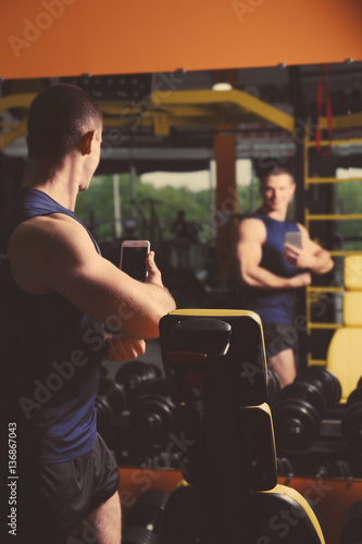Young handsome man taking s...