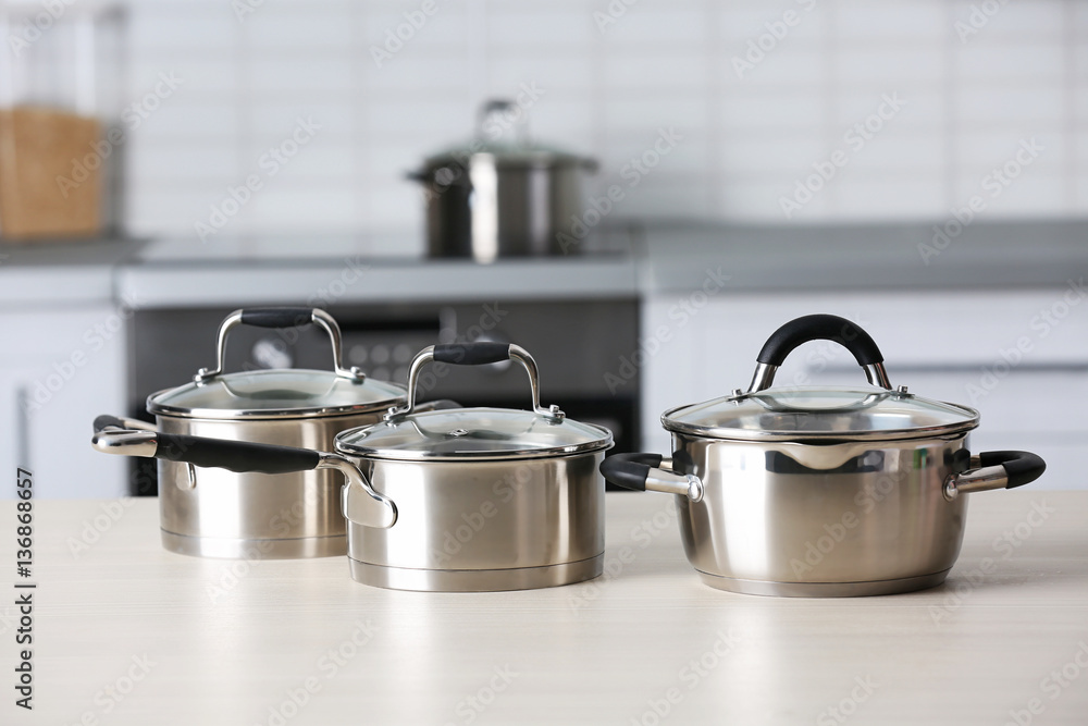 Metal pans on kitchen counter Metal pans on kitchen counter