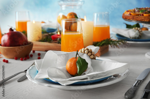 Beautiful table setting with tangerines