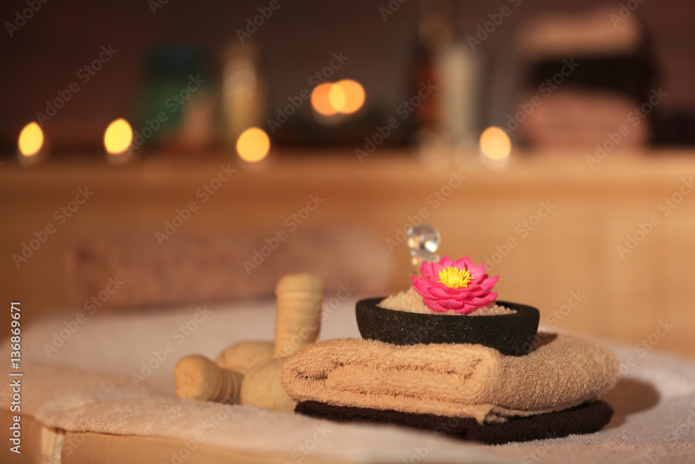 Natural treatments and alight candles in spa salon