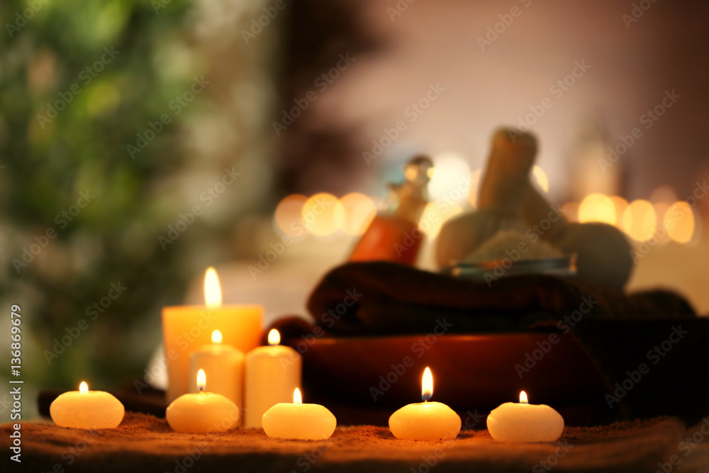 Natural treatments and alight candles in spa salon Natural treatments and alight candles in spa salon