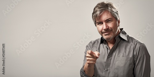 Fotografie Man pointing to the camera