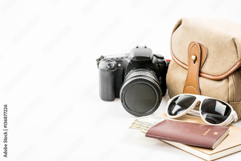 Traveler's accessories and items on white.