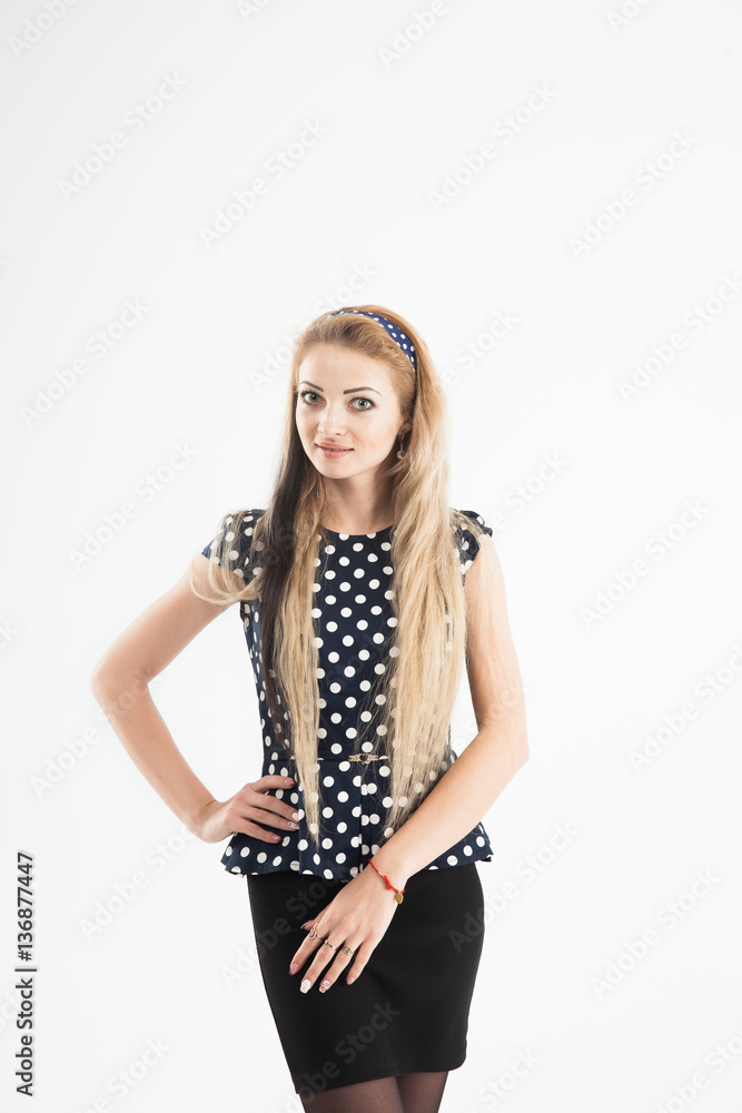 portrait of a young woman - administrator in a stylish suit on a portrait of a young woman - administrator in a stylish suit on a