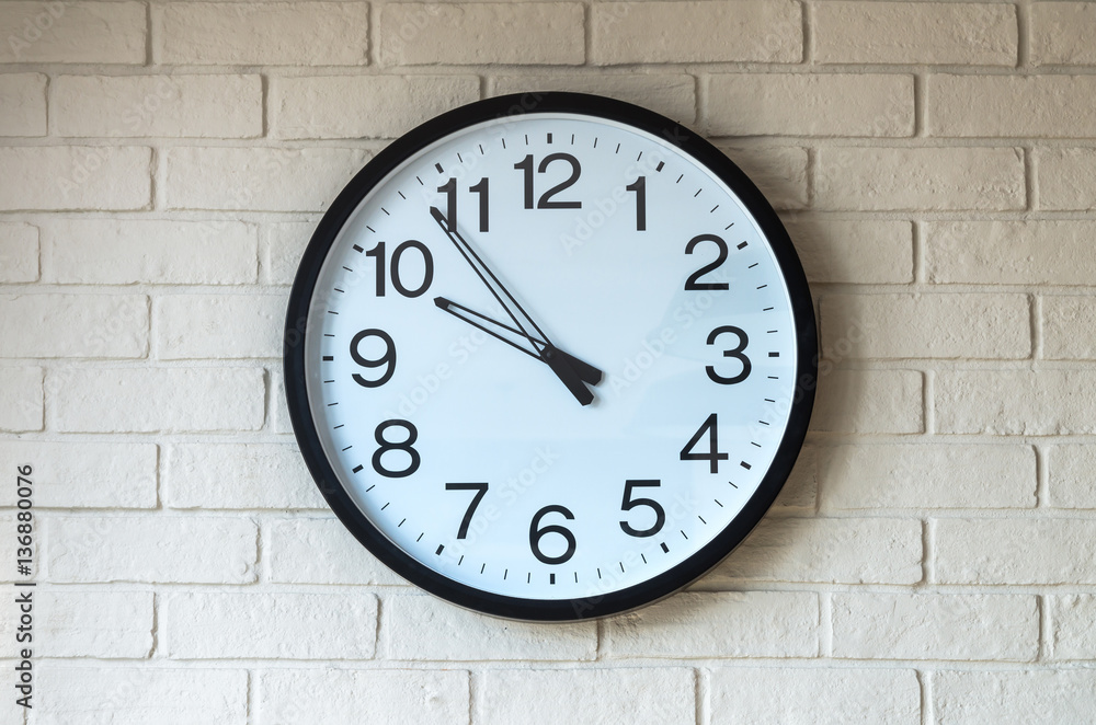 Clock on brick wall Clock on brick wall