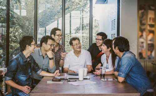 Group Of Asian Business people with casual suit working with hap