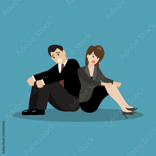 Desperate worker sitting back to back
