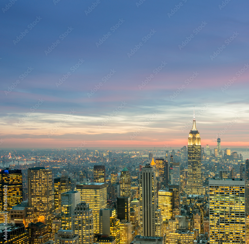 Naklejka premium View of New York Manhattan during sunset hours