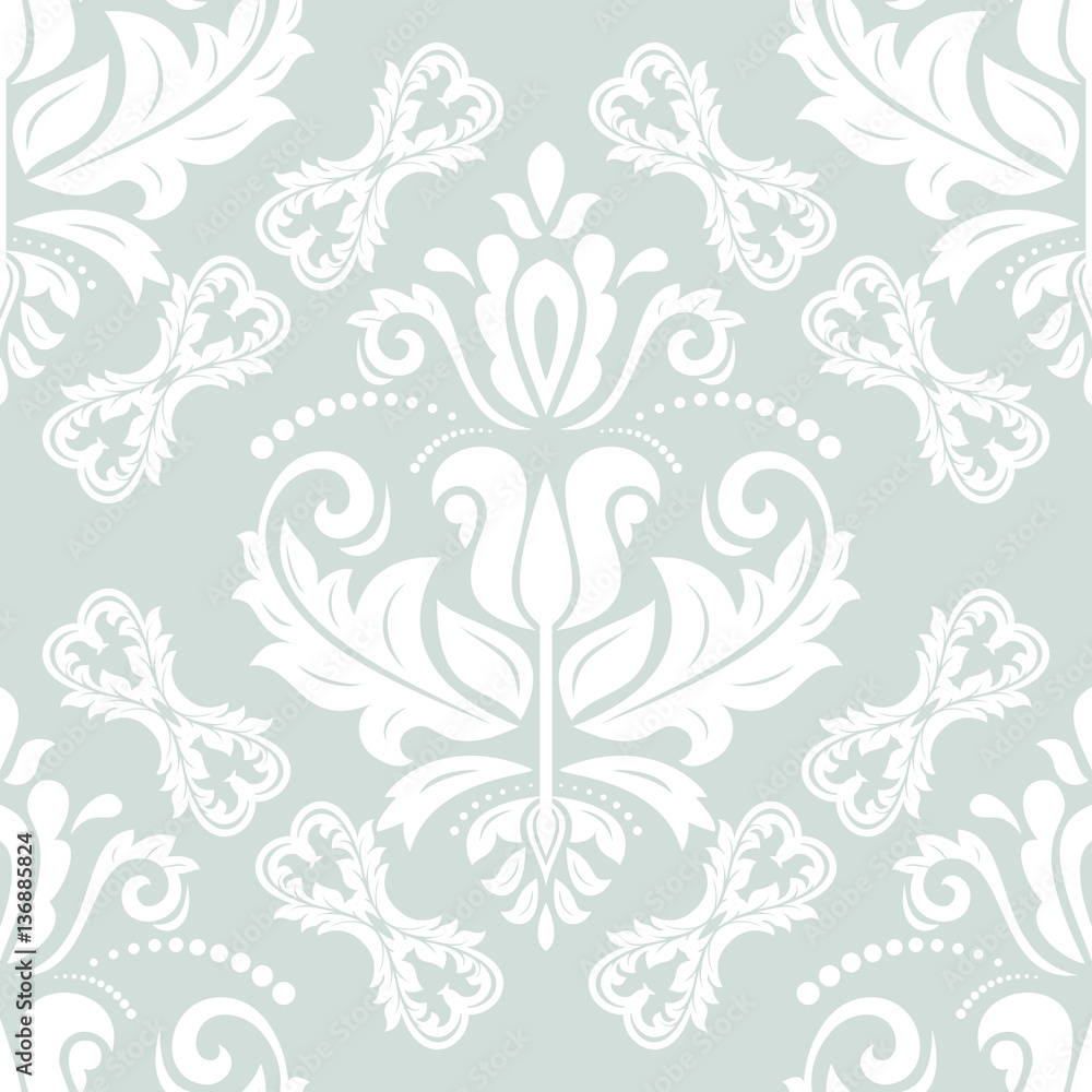 Seamless damask pattern. Traditional classic orient ornament. Light blue and white pattern Seamless damask pattern. Traditional classic orient ornament. Light blue and white pattern
