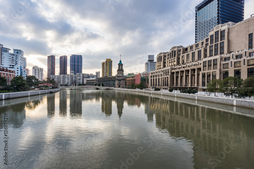 River And Modern Buildings Against Sky in Shanghai China.