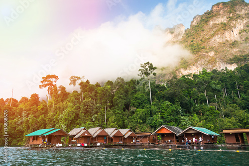 bamboo house and canoe at Resort at Ratchaprapha Dam at Khao Sok National Park, Surat Thani Province, Thailand.