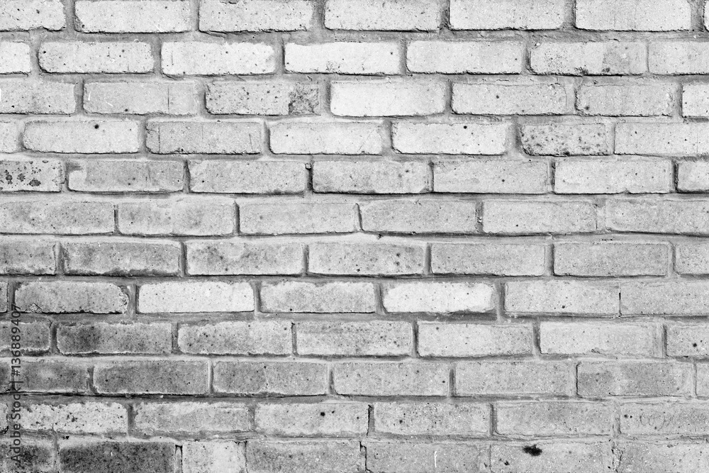 Fototapeta premium Brick texture with scratches and cracks