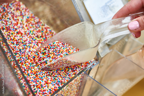 Canvas Print confectionery strew colored balls dragees