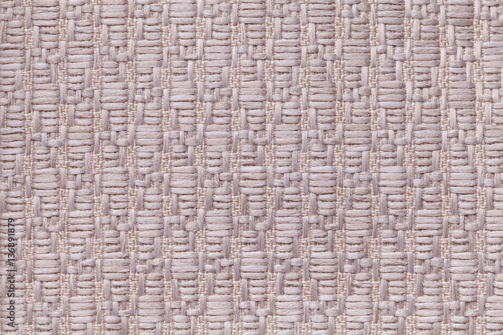 Brown knitted woolen background with a pattern of soft, fleecy cloth. Texture of textile closeup. Brown knitted woolen background with a pattern of soft, fleecy cloth. Texture of textile closeup.
