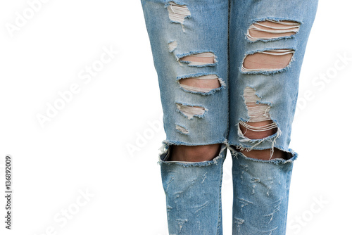 Pants torn at the knees