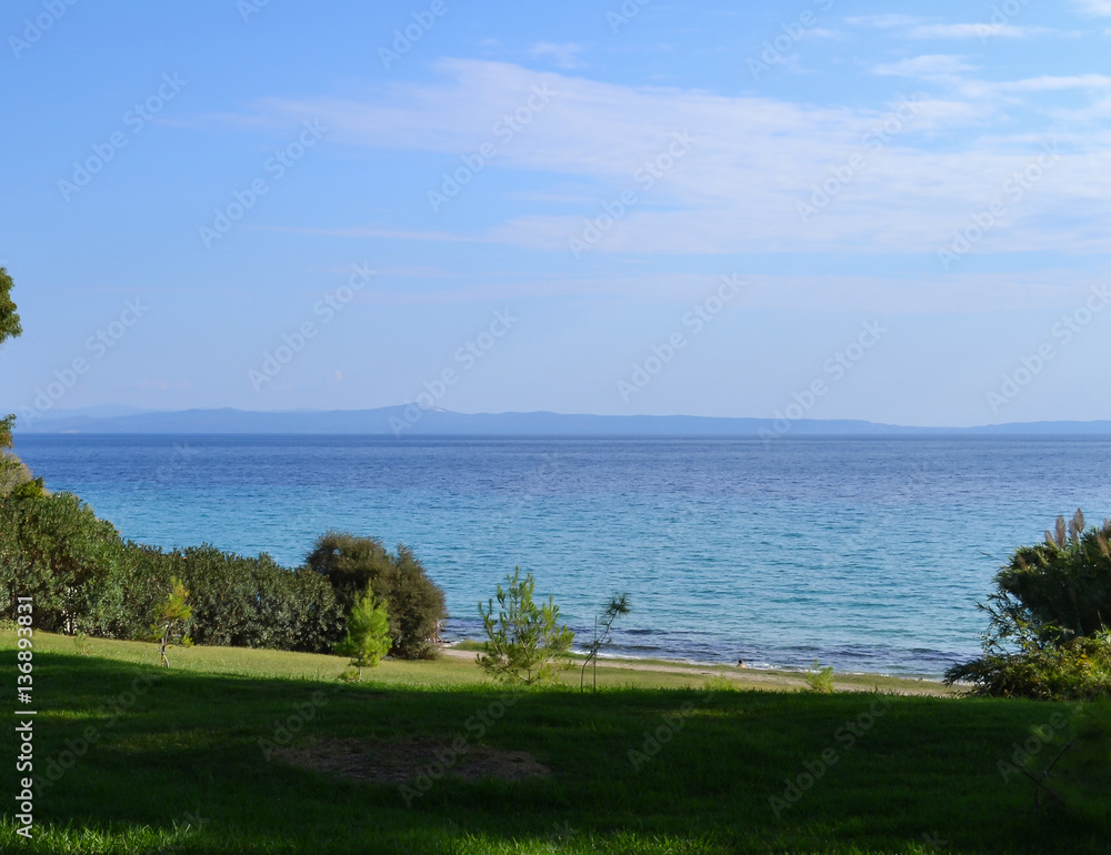 Sea view with a green lawn. Greece. Kassandra. Halkidiki