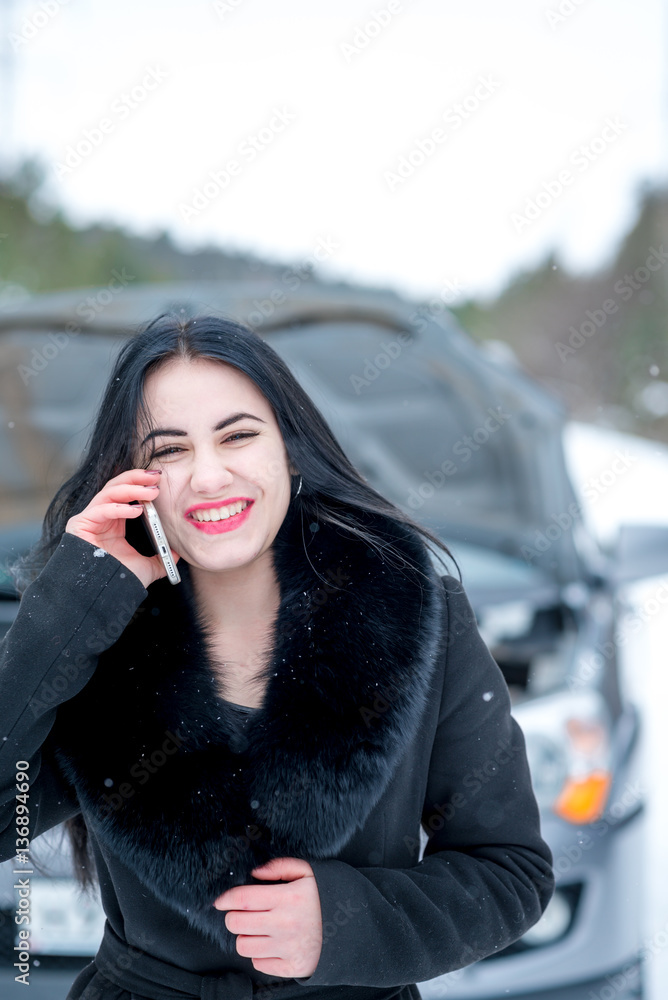 Winter car breakdown - young beautiful woman call for help, road Winter car breakdown - young beautiful woman call for help, road