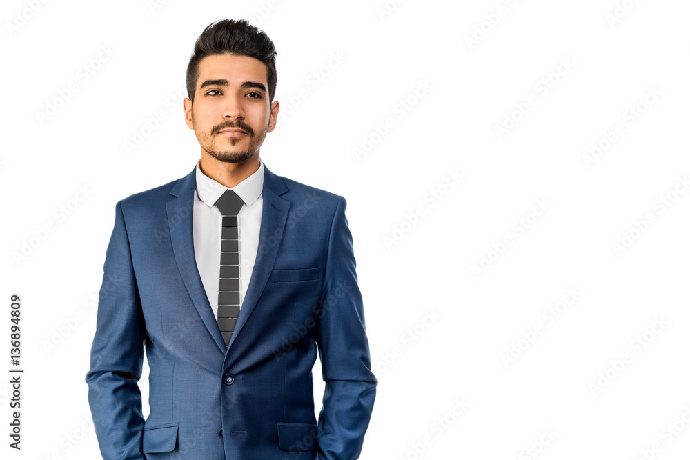 Young attractive man in a blue suit on a white background. Isolated Young attractive man in a blue suit on a white background. Isolated