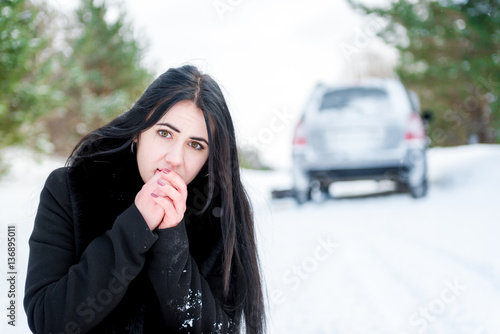 portrait of a beautiful young girl, whose car broke down in the