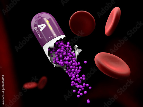 3d Illustration of Vitamin A Capsule dissolves in the stomach photo