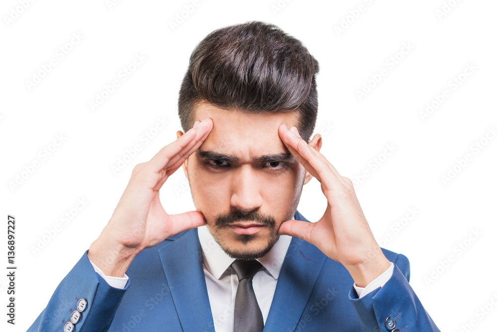 Young attractive man in a blue suit feels pain on a white background. Isolated Young attractive man in a blue suit feels pain on a white background. Isolated
