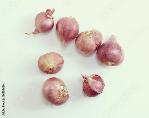 red onion bulb on white background