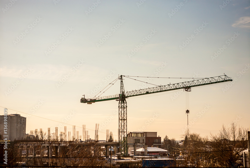 Construction with a crane in industrializes area