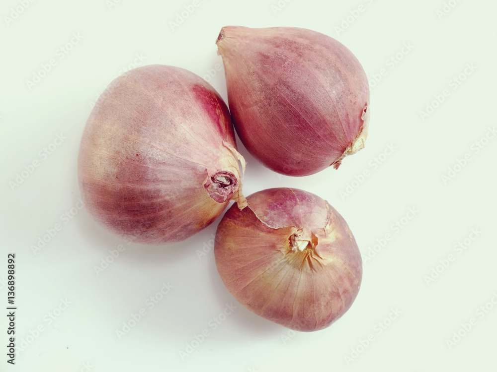 red onion bulb on white background