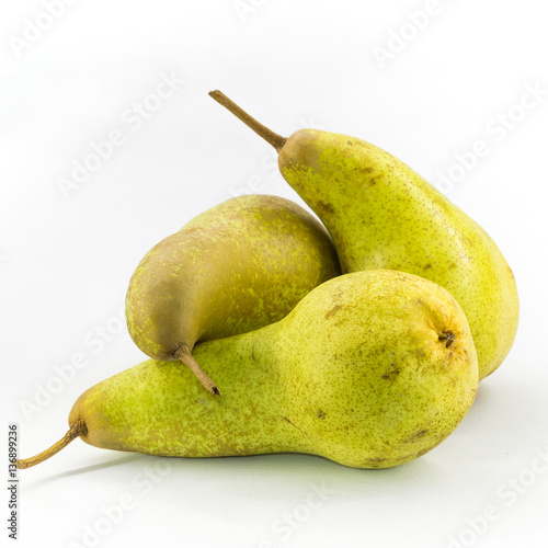 Three Abate Fetel pears isolated on white background.