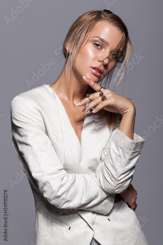 Portrait of young beauty woman in casual white jacket