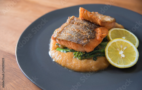 Pan seared salmon with potato puree and young broccoli