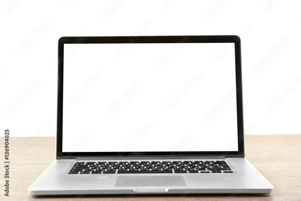 Laptop on wooden desk Laptop on wooden desk